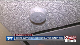 Crews survey neighborhood after deadly fire
