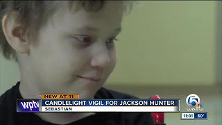 Candlelight vigil held for Jackson Hunter