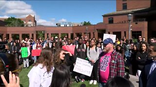 Faculty stands with Marquette students during protest