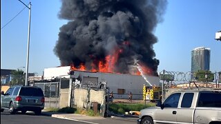 Flames engulf vacant building west of I-15 in Las Vegas