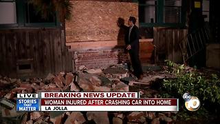 Woman injured after driving into La Jolla home