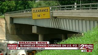 18-Wheeler strikes overpass on Crosstown Expy.