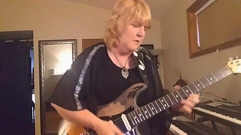 Cari Dell- Female lead guitarist jamming to a Flamenco Latin jam track