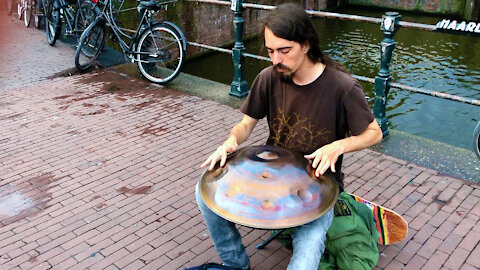 Amsterdam Street Musician plays ‘Hang drum'
