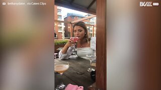 Woman breaks glass after downing cocktail in one go! - 1