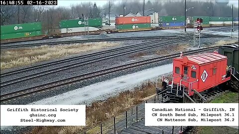 EB Intermodal/Autorack with Passenger Car on end of train in Griffith, IN on February 16, 2023