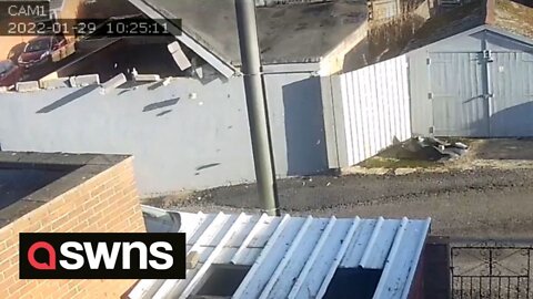 Footage shows garage roof being lifted and blown away during Storm Malik