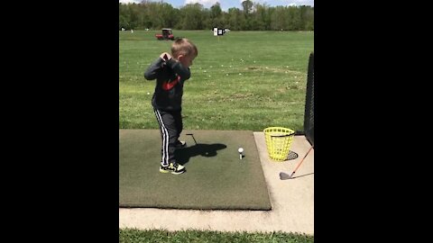 Little boy's golf swing ends in hilarious epic fail
