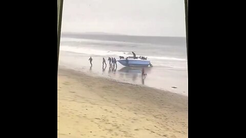 A Group of men Storm the Beach and Dispersed Throughout the City and into Vehicle, Carlsbad Ca