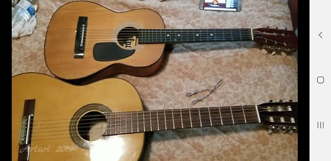 Stringing and Tuning two $20 Guitars used from Offerup