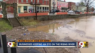 Businesses keeping an eye on the rising river