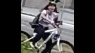 Girl falls off bike