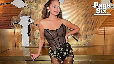 Chrissy Teigen reveals her 'boob lift scars' in daring sheer dress