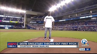 Devin "Motor" Singletary throws out the first pitch at the Miami Marlins game