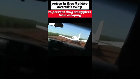 police in Brazil strike aircraft's wing to prevent drug smugglers from escaping by air