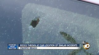 Couple's car struck by rocks while traveling in Pacific Beach