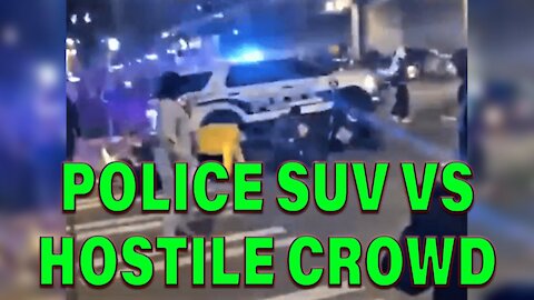 Police Car Drives Through Hostile Crowd On Video - LEO Round Table S06E04a