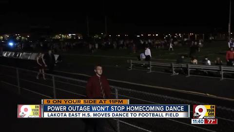 Without power, Lakota East High School holds homecoming dance under the lights