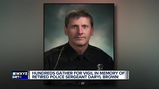 Hundreds gather for vigil in memory of retired police sergeant