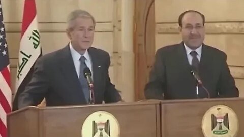 President George W. Dodges A Thrown Shoe