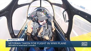 Veteran taken for flight in WWII plane