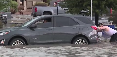 Drivers stall out in flooded roads during monsoon rain in Las Vegas