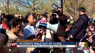 Students walk out of class