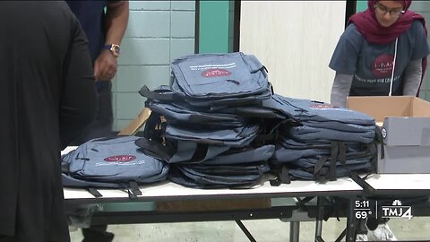 Community group packs and donates backpacks to local students