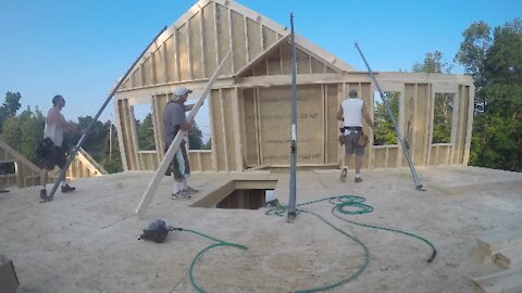 Lifting a double gable end wall