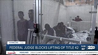 Federal judge blocks lifting of Title 42