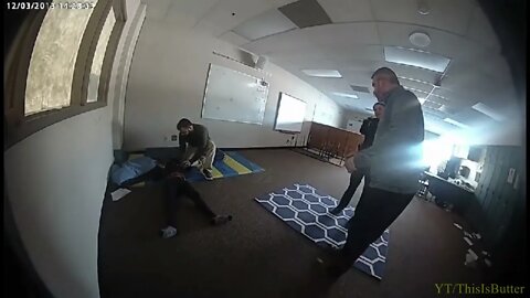 Police body cam of a child being detained by police while having a mental breakdown in a classroom