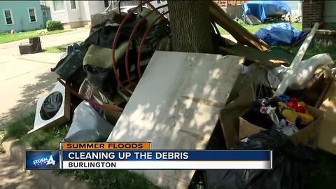 Crews cleanup flood debris in Burlington