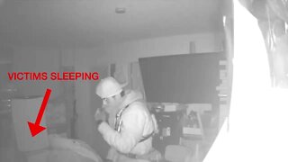 Chilling video shows burglar standing over sleeping victims