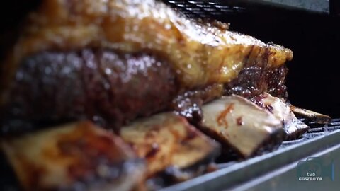 Two Cowboys is Squeezing the Fat from a Magnum Wagyu Beef Rib at HQ