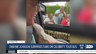Dwayne "The Rock" Johnson surprises fans on celebrity tour bus