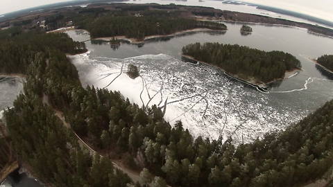 Frozen lake allows skaters to explore stunning winter landscape