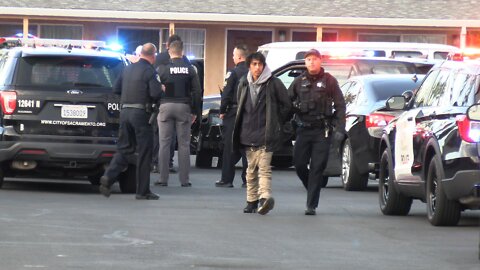 Police Searching For Wanted Criminals At A Local Welfare Motel