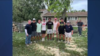 Wilmot Football players lend a helping hand