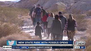 Visitor hike new state park with fossils