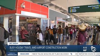 Busy holiday travel amid airport construction work