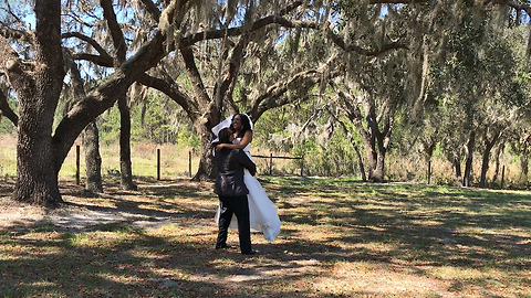 Bride and Groom having fun during their wedding photo shoot