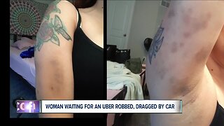 Woman waiting for Uber ride robbed, dragged by car in Akron