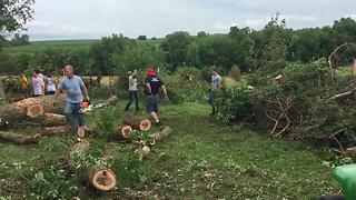 Friends and family come together to clean up tornado damage in western Iowa