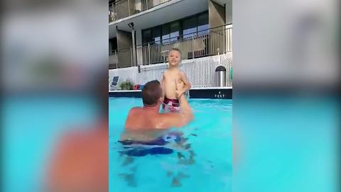 Tot Boy Loses His Swimming Trunks In A Pool