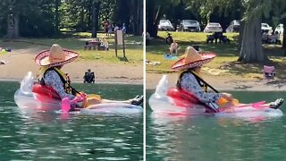 Lady is living her best life paddling & eating at the lake