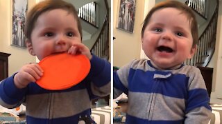 Adorable Baby Boy Thinks The Remote Control Is Hysterical