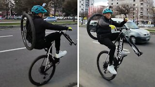 Guy with only one tire rides bike like a unicycle