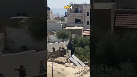 Palestinian child is taken from his home by the Israeli military in his underwear