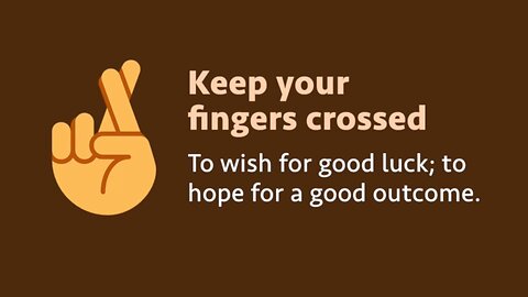 Idiom: Keep your fingers crossed (meaning, examples, origin, pronunciation)