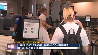 Holiday travel rush continues